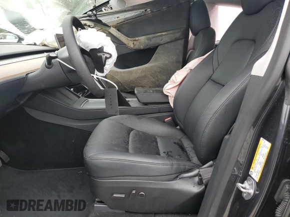 2024 Tesla Model Y Long Range with VIN 7SAYGAEE7RF005786, listed as a Copart auction lot 58415195 with 8,700 mi miles and Salvage title. Bid and sale history available at DreamBid. Image 7.