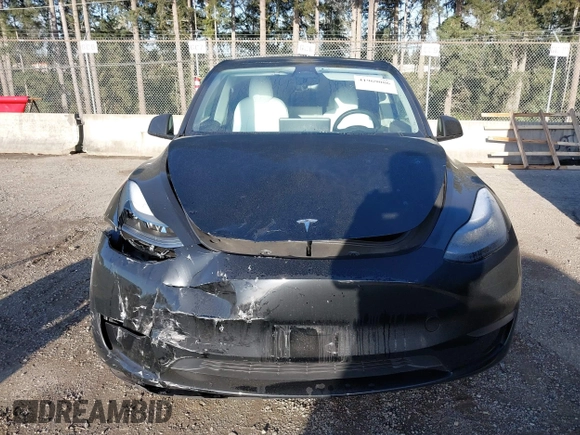2023 Tesla Model Y Long Range z VIN 7SAYGDEE9PF637042, wystawiony jako IAAI lot #41969086 z przebiegiem 25 524 mil mil oraz . Historia ofert i sprzedaży dostępna na DreamBid. Obrazek 12.
