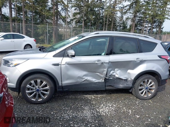 2017 Ford Escape Titanium with VIN 1FMCU9J97HUE98023, listed as a IAAI auction lot 41745843 with 24,857 mi miles. Bid and sale history available at carsss.com. Image 13.