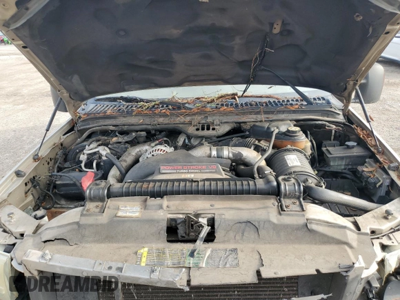 2004 Ford Excursion Limited z VIN 1FMNU42P64EA06742, wystawiony jako Copart lot #71989004 z przebiegiem 238 839 mil mil oraz Szkoda całkowita • Salvage title. Historia ofert i sprzedaży dostępna na DreamBid. Obrazek 13.