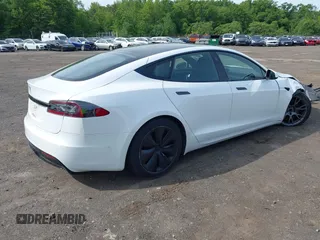 2022 Tesla Model S with VIN 5YJSA1E58NF467644, listed as a IAAI auction lot 42344403 with 52,628 mi miles and . Bid and sale history available at DreamBid. Image 4.