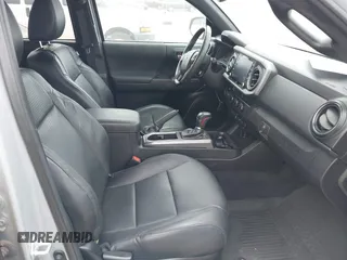 2021 Toyota Tacoma 4WD SR5 with VIN 3TMDZ5BN5MM116584, listed as a IAAI auction lot 41548175 with 23,031 mi miles. Bid and sale history available at carsss.com. Image 5.