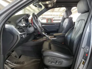 2014 BMW X5 xDrive50i z VIN 5UXKR6C58E0C03414, wystawiony jako Copart lot #47437935 z przebiegiem 126 402 mil mil oraz Szkoda całkowita • Salvage title. Historia ofert i sprzedaży dostępna na DreamBid. Obrazek 7.