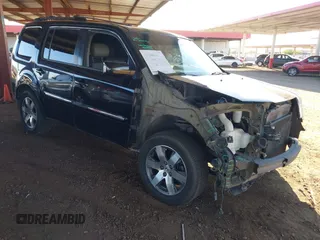2013 Honda Pilot Touring z VIN 5FNYF3H98DB033423, wystawiony jako IAAI lot #42452524 z przebiegiem 185 260 mil mil oraz . Historia ofert i sprzedaży dostępna na DreamBid. Obrazek 1.
