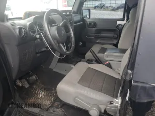 2010 Jeep Wrangler Rubicon with VIN 1J4BA6D14AL198524, listed as a Copart auction lot 65260235 with Not provided miles and Clean title. Bid and sale history available at DreamBid. Image 8.