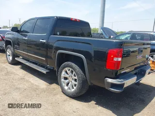 2015 GMC Sierra 1500 SLT with VIN 3GTU2VEC6FG328135, listed as a IAAI auction lot 42056412 with 151,458 mi miles and . Bid and sale history available at DreamBid. Image 3.
