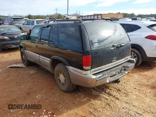 2000 GMC Jimmy SLE Convenience with VIN 1GKDT13W8Y2168245, listed as a IAAI auction lot 41348643 with 285,714 mi miles. Bid and sale history available at carsss.com. Image 3.