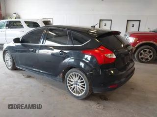 2012 Ford Focus SEL with VIN 1FAHP3M24CL331586, listed as a IAAI auction lot 42086129 with 193,060 mi miles. Bid and sale history available at carsss.com. Image 3.