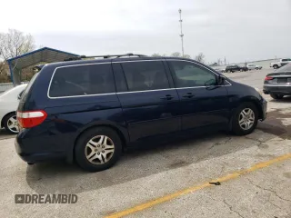 2007 Honda Odyssey EX with VIN 5FNRL38477B101619, listed as a Copart auction lot 54134505 with 129,468 mi miles and Clean title. Bid and sale history available at DreamBid. Image 3.