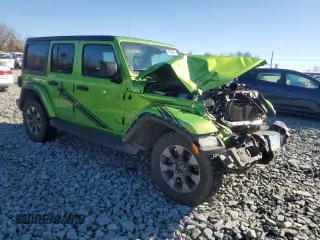 2019 Jeep Wrangler Unlimited Sahara with VIN 1C4HJXEN2KW510038, listed as a Copart auction lot 89243675 with 142,738 mi miles and Salvage title. Bid and sale history available at DreamBid. Image 4.