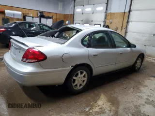 2004 Ford Taurus SE with VIN 1FAFP53224G175353, listed as a Copart auction lot 52713935 with 213,375 mi miles and Salvage Title. Bid and sale history available at DreamBid. Image 3.