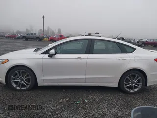 2017 Ford Fusion SE z VIN 3FA6P0H71HR201799, wystawiony jako IAAI lot #41346018 z przebiegiem 51 126 mil mil oraz . Historia ofert i sprzedaży dostępna na DreamBid. Obrazek 14.