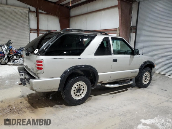 2000 Chevrolet Blazer LS z VIN 1GNCT18W9YK188091, wystawiony jako Copart lot #78592844 z przebiegiem 69 497 mil mil oraz Szkoda całkowita • Salvage title. Historia ofert i sprzedaży dostępna na DreamBid. Obrazek 3.