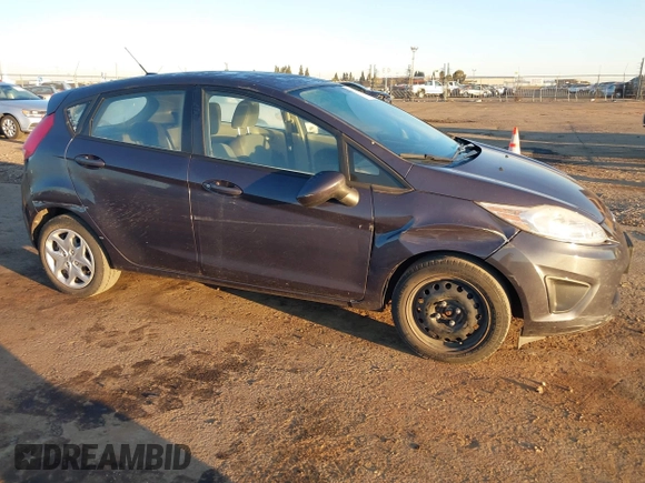 2013 Ford Fiesta S with VIN 3FADP4TJ8DM132523, listed as a IAAI auction lot 41700402 with 53,835 mi miles and . Bid and sale history available at DreamBid. Image 6.