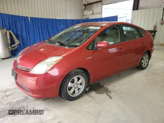 2007 Toyota Prius z VIN JTDKB20U273292311, wystawiony jako Copart lot #57529265 z przebiegiem Nie podano mil oraz Czysty tytuł • Clean title. Historia ofert i sprzedaży dostępna na DreamBid. Obrazek 1.