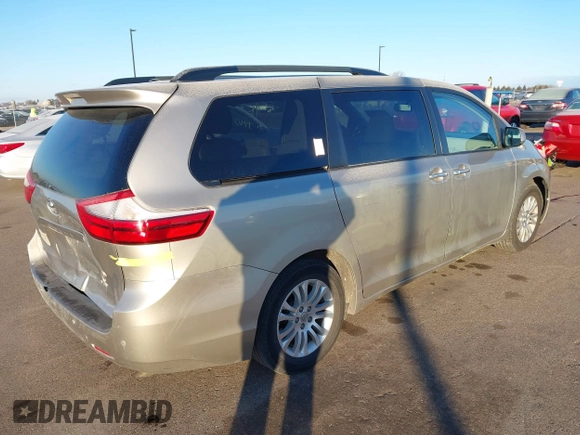 2016 Toyota Sienna XLE z VIN 5TDYK3DC8GS713481, wystawiony jako IAAI lot #41239824 z przebiegiem 176 935 mil mil oraz . Historia ofert i sprzedaży dostępna na DreamBid. Obrazek 4.
