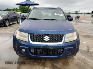2010 Suzuki Grand Vitara Limited z VIN JS3TE0D77A4100128, wystawiony jako Copart lot #60221835 z przebiegiem 188 325 mil mil oraz Szkoda całkowita • Salvage title. Historia ofert i sprzedaży dostępna na DreamBid. Obrazek 5.