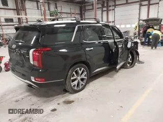 2021 Hyundai Palisade Limited z VIN KM8R5DHE7MU245923, wystawiony jako IAAI lot #42091365 z przebiegiem 100 565 mil mil oraz . Historia ofert i sprzedaży dostępna na DreamBid. Obrazek 4.