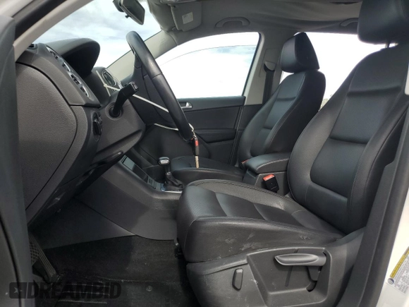 2010 Volkswagen Tiguan Wolfsburg Edition with VIN WVGAV7AX7AW003188, listed as a Copart auction lot 56692535 with 121,502 mi miles and Salvage title. Bid and sale history available at DreamBid. Image 7.