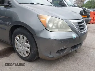2009 Honda Odyssey LX with VIN 5FNRL38269B043326, listed as a IAAI auction lot 42872714 with 235,087 mi miles and . Bid and sale history available at DreamBid. Image 13.