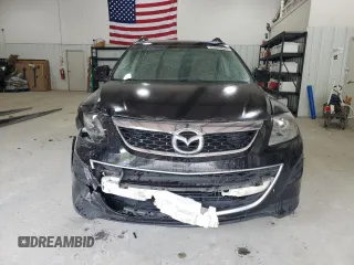 2012 Mazda CX-9 Touring z VIN JM3TB2CA7C0359154, wystawiony jako Copart lot #54007685 z przebiegiem 192 671 mil mil oraz Szkoda całkowita • Salvage title. Historia ofert i sprzedaży dostępna na DreamBid. Obrazek 5.