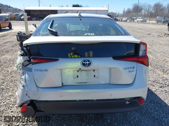 2021 Toyota Prius L Eco z VIN JTDKAMFUXM3142402, wystawiony jako IAAI lot #41665484 z przebiegiem 67 416 mil mil oraz . Historia ofert i sprzedaży dostępna na DreamBid. Obrazek 16.