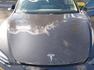 2024 Tesla Model 3 with VIN 5YJ3E1EA0RF718703, listed as a IAAI auction lot 41278243 with 6,504 mi miles. Bid and sale history available at carsss.com. Image 10.