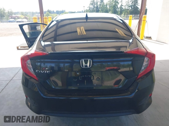 2016 Honda Civic EX-L z VIN 2HGFC1F76GH650308, wystawiony jako IAAI lot #42408661 z przebiegiem Nie podano mil oraz . Historia ofert i sprzedaży dostępna na DreamBid. Obrazek 16.
