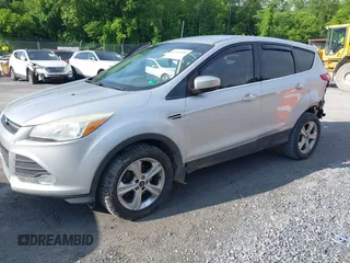 2013 Ford Escape SE z VIN 1FMCU0GX5DUC72347, wystawiony jako IAAI lot #42370050 z przebiegiem 167 212 mil mil oraz . Historia ofert i sprzedaży dostępna na DreamBid. Obrazek 2.