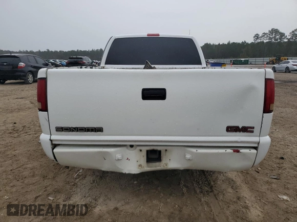 1998 GMC Sonoma z VIN 1GTCS1442WK516237, wystawiony jako Copart lot #86024314 z przebiegiem Nie podano mil oraz Szkoda całkowita • Salvage title. Historia ofert i sprzedaży dostępna na DreamBid. Obrazek 6.