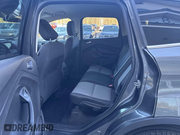 2018 Ford Escape SE with VIN 1FMCU9GD8JUA76991, listed as a IAAI auction lot 42013849 with 213,827 mi miles. Bid and sale history available at carsss.com. Image 8.