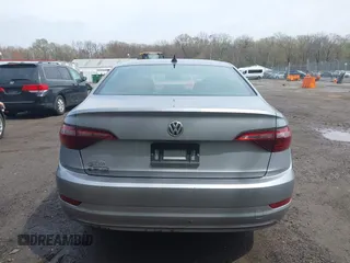 2021 Volkswagen Jetta S z VIN 3VWC57BUXMM048600, wystawiony jako IAAI lot #41956222 z przebiegiem 59 870 mil mil oraz . Historia ofert i sprzedaży dostępna na DreamBid. Obrazek 16.