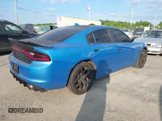 2015 Dodge Charger SXT with VIN 2C3CDXHG1FH848019, listed as a IAAI auction lot 42124399 with 175,247 mi miles and . Bid and sale history available at DreamBid. Image 4.