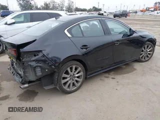 2021 Mazda 3 Premium with VIN JM1BPADL4M1329041, listed as a IAAI auction lot 42291604 with 93,248 mi miles and . Bid and sale history available at DreamBid. Image 4.