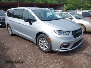 2024 Chrysler Pacifica Touring L with VIN 2C4RC1BG9RR129162, listed as a IAAI auction lot 42120697 with 36,806 mi miles and . Bid and sale history available at DreamBid. Image 1.