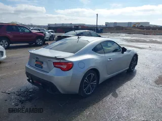 2014 Subaru BRZ Limited with VIN JF1ZCAC11E8604633, listed as a IAAI auction lot 41466704 with 142,025 mi miles. Bid and sale history available at carsss.com. Image 4.