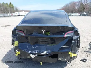 2022 Tesla Model Y Performance with VIN 7SAYGDEF7NF310113, listed as a IAAI auction lot 42038407 with 46,052 mi miles and . Bid and sale history available at DreamBid. Image 17.