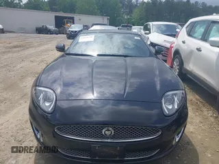 2012 Jaguar XK with VIN SAJWA4FB8CLB47049, listed as a IAAI auction lot 42118136 with 60,953 mi miles. Bid and sale history available at carsss.com. Image 12.