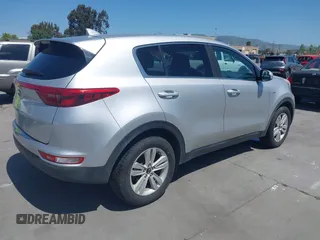 2017 Kia Sportage LX with VIN KNDPMCAC8H7130334, listed as a IAAI auction lot 42184166 with 128,364 mi miles and . Bid and sale history available at carsss.com. Image 4.