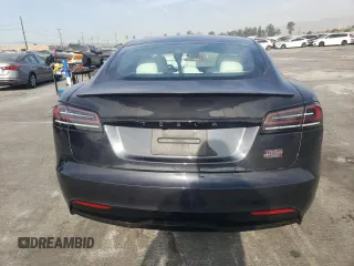 2023 Tesla Model S Plaid с VIN 5YJSA1E67PF528820, выставлен на аукционе Copart как лот 83111464 с пробегом 17 858 миль миль и Списание • Salvage title. История ставок и продаж доступна на DreamBid. Изображение 6.