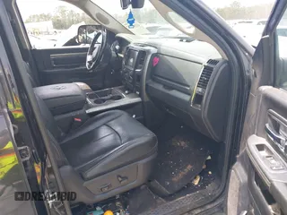 2018 Ram 2500 Laramie with VIN 3C6UR5NLXJG256688, listed as a IAAI auction lot 42168537 with 214,596 mi miles and . Bid and sale history available at DreamBid. Image 5.