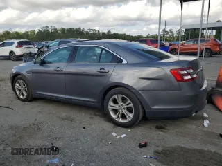 2013 Ford Taurus SEL with VIN 1FAHP2E83DG210569, listed as a Copart auction lot 53615785 with 264,639 mi miles and Clean Title. Bid and sale history available at carsss.com. Image 2.