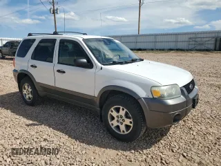 2005 Ford Escape XLT with VIN 1FMYU93145KA28777, listed as a Copart auction lot 58013995 with 94,308 mi miles and Clean title. Bid and sale history available at DreamBid. Image 4.