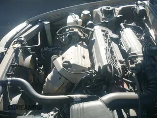 1994 Toyota Camry DX with VIN 4T1SK11E4RU414418, listed as a IAAI auction lot 43489873 with 223,446 mi miles and . Bid and sale history available at DreamBid. Image 12.