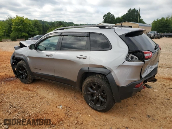 2016 Jeep Cherokee Trailhawk with VIN 1C4PJMBS4GW236966, listed as a Copart auction lot 63190565 with 101,017 mi miles and Salvage title. Bid and sale history available at DreamBid. Image 2.