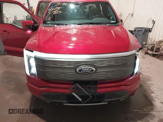 2022 Ford F-150 Lightning Pro с VIN 1FT6W1EV2NWG01661, выставлен на аукционе IAAI как лот 41785750 с пробегом 21 156 миль миль и . История ставок и продаж доступна на DreamBid. Изображение 10.