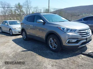 2017 Hyundai Santa Fe 2.4L z VIN 5NMZUDLB7HH015347, wystawiony jako IAAI lot #42035606 z przebiegiem 118 305 mil mil oraz . Historia ofert i sprzedaży dostępna na DreamBid. Obrazek 1.
