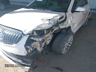 2014 Buick LaCrosse Premium II with VIN 1G4GF5G31EF166411, listed as a IAAI auction lot 41240048 with 82,231 mi miles and . Bid and sale history available at DreamBid. Image 6.