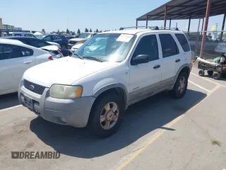2001 Ford Escape XLT with VIN 1FMYU04131KB70753, listed as a IAAI auction lot 42174549 with 209,485 mi miles and . Bid and sale history available at DreamBid. Image 2.