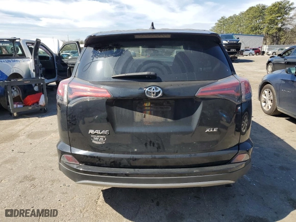 2018 Toyota RAV4 XLE with VIN 2T3WFREV0JW469717, listed as a Copart auction lot 47416435 with 97,142 mi miles and Salvage Title. Bid and sale history available at carsss.com. Image 6.